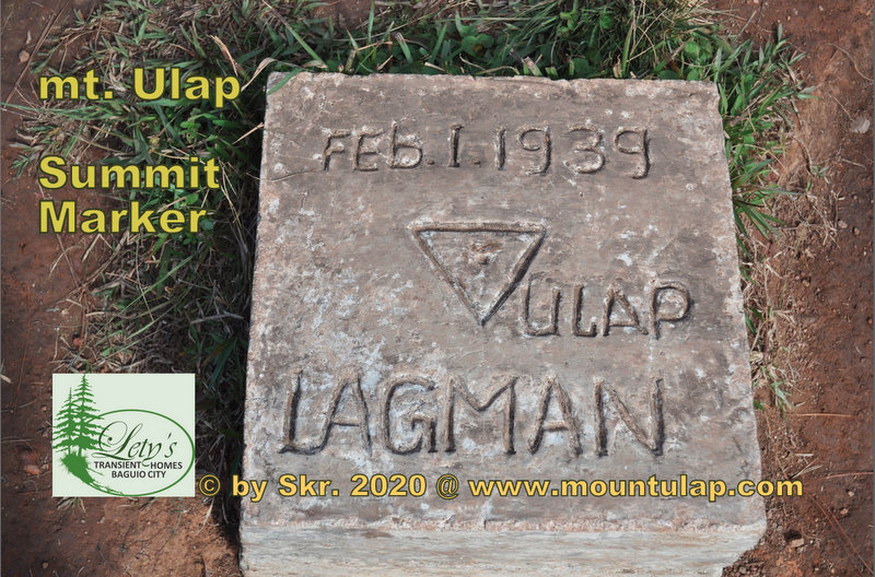 A stone marker at Mount Ulap Summit located within the  Ampucao - Santa Fe mountain ridges 